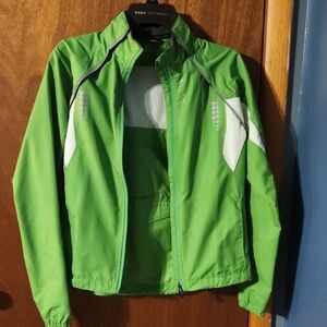SUGOI Green Convertible Jacket + Vest With Reflective Details.
